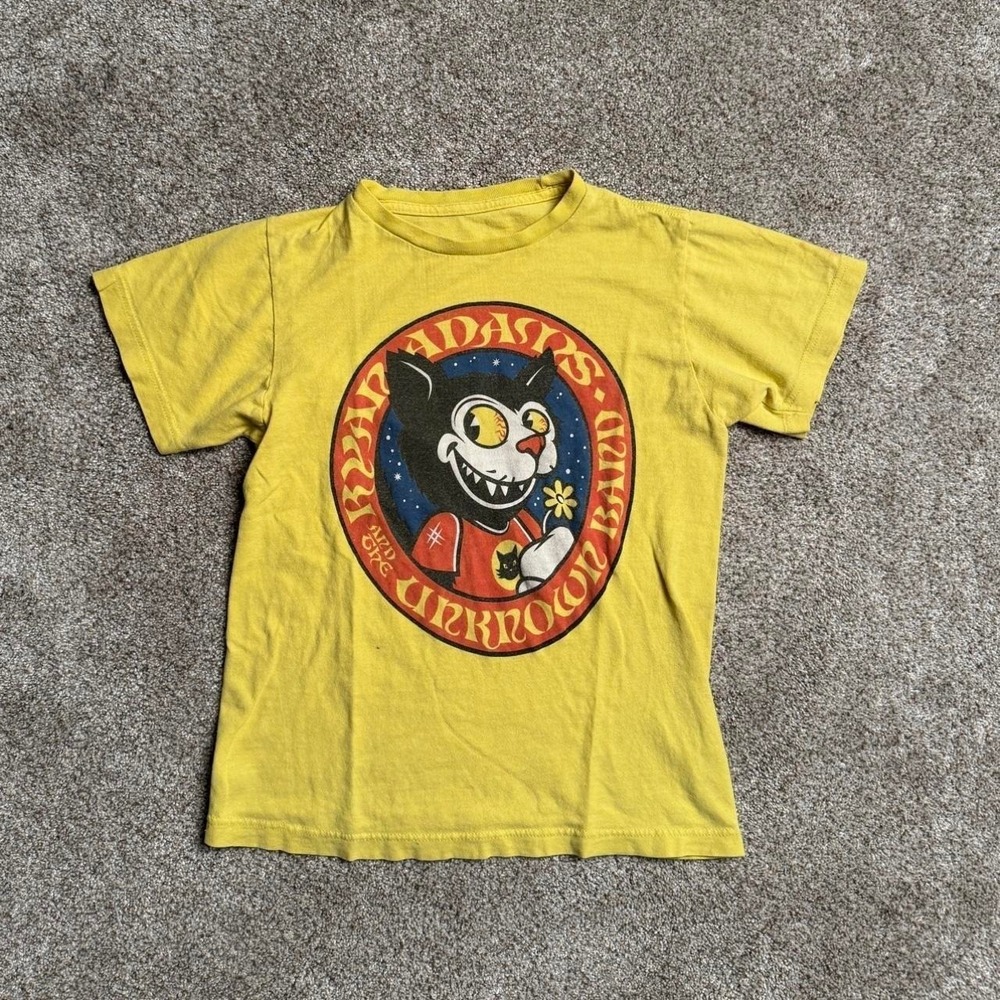 YELLOW RHYTHM ADAMS AND THE UNKNOWN BAND BABY TEE